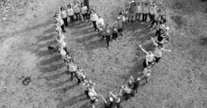 People in form of a heart